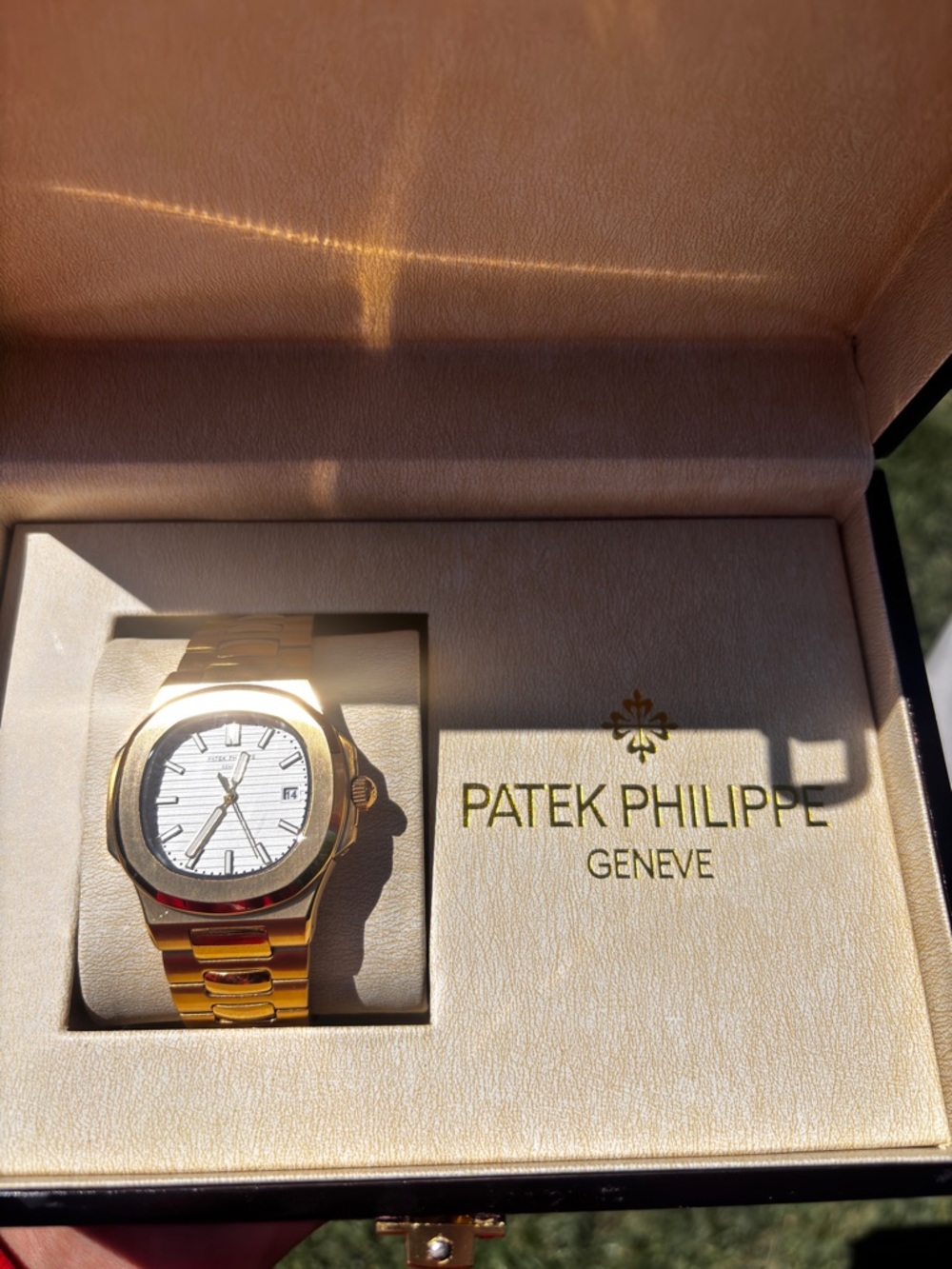 Patek Philippe Gold Watch with White Dial and Gold Bracelet